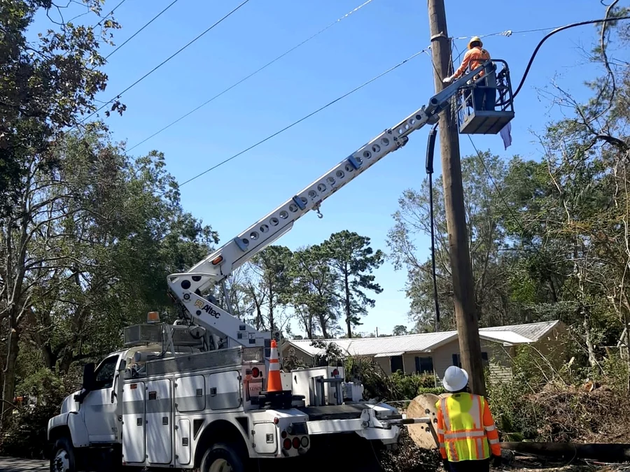 Storm restoration work on a damaged line